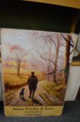 A reproduction James Purdey & Sons metal sign.