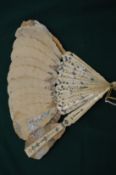 A decorative fan.