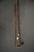 Two old walking sticks.