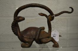 A Chinese bronze snake attacking a tortoise.