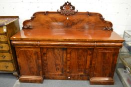 A good Victorian mahogany chiffonier with gallery back, four frieze drawers over four panelled