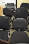 Six various office chairs.