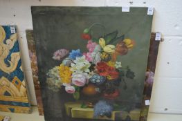 A Dutch School style still life of flowers in a vase on a ledge, oil on canvas, unframed.