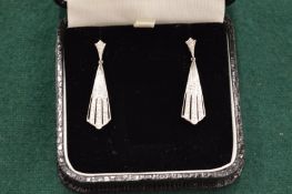 A good pair of 18ct white gold and diamond Art Deco style fan shaped pendant earrings.