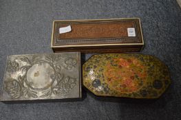 Three decorative boxes.