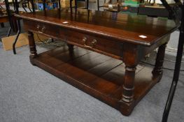 A good oak two drawer two-tier rectangular coffee table.