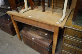 A pine kitchen table.