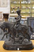 After Barye, a good large bronze of a huntsman on horseback, on a marble base.
