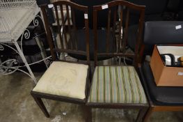 Two pairs of chairs.