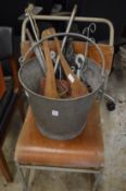 A galvanized bucket, cast iron saddle rack, an old chair etc.