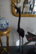 A life size pair of bronze storks.
