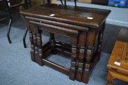 An oak nest of tables.