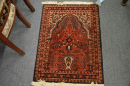 A small Persian prayer rug, 100cm x 87cm.