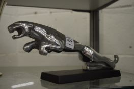 A model of the Jaguar car mascot.