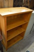 A modern oak open bookcase.
