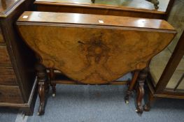A good Victorian figured walnut Sutherland table.