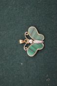 A 14ct gold diamond and malecite butterfly pendant.