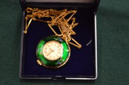A pendant watch with enamel bezel.