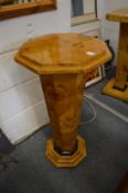 A pair of Art Deco style hexagonal shaped pedestal stands.