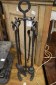 Wrought iron fireside companion set.