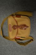 A Billingham canvas and leather shoulder bag.