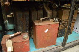 Old petrol cans etc.