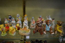 A collection of Beswick novelty figures to include hippos on holiday.