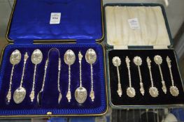Two cased sets of silver coffee spoons with apostle terminals, one set with sugar tongs.