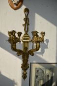 A pair of large ormolu twin branch naturalistic style wall appliques.