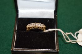 An 18ct gold and diamond five stone ring.
