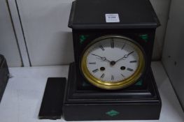 A slate mantel clock.