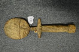 A carved African figure.