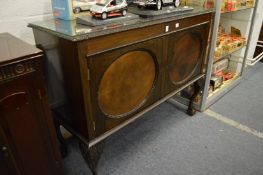 A mahogany two door sideboard.