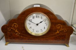 An Edwardian inlaid mahogany mantel clock.