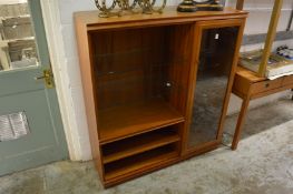 A teak display cabinet.