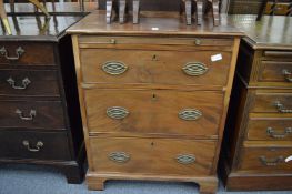 A Georgian style small mahogany three drawer bachelor's chest with brushing slide.