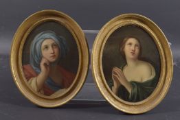 ITALIAN SCHOOL (19TH CENTURY) AFTER GUIDO RENI a pair of oil on board portraits of female figures,