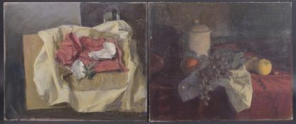 GEORGE WEISSBORT (1928 - 2013) A STILL LIFE a bread bin, apples and grapes on a white cloth. Oil