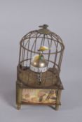 A SMALL BIRD CAGE CLOCK 5.5ins high.