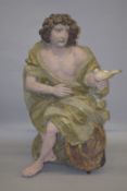 A GOOD CARVED WOOD PAINTED FAIRGROUND FIGURE, a classical man holding a dove. 47ins high.