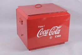 A COCA COLA RED METAL COOLER.