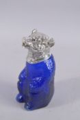 A BRISTOL BLUE GLASS NOVELTY DECANTER with plated bear head. 9ins high.