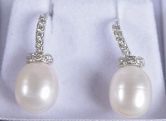 A PAIR OF 18CT WHITE GOLD PEARL AND RBC DIAMOND DROPLET EARRINGS, boxed R/C diamonds 0.38ct.