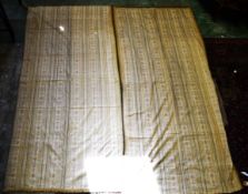 A PAIR OF LONG YELLOW SILK BROCADE CURTAINS. 98ins x 46ins.