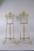 A LARGE PAIR OF BRASS PICTURE EASELS.