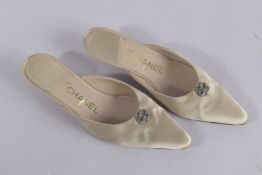 A PAIR OF CHANEL SILK SHOES, size 38.5. Signs of wear.