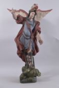 AN 18TH CENTURY CARVED AND PAINTED WOODEN FIGURE OF ST GEORGE. 31ins high.
