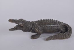 A BRONZE CROCODILE. 9ins long.