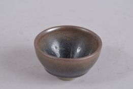 A CHINESE HARES FUR GLAZE TEA CUP. 8cm diameter.