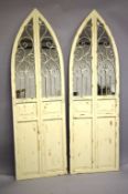 A PAIR OF WHITE GARDEN MIRRORS. 6ft high x 1ft 10ins wide.